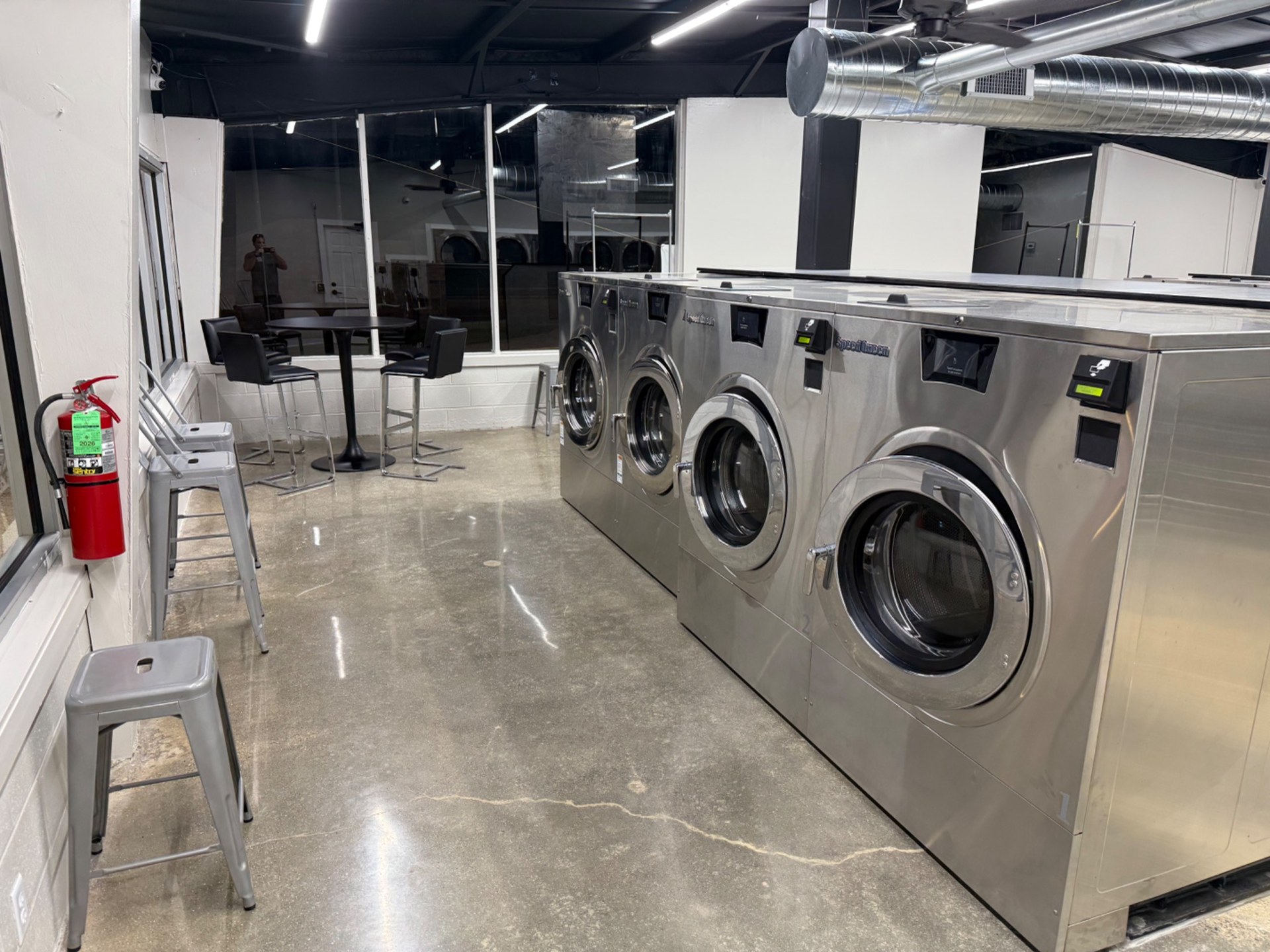 Row of stainless steel Speed Queen washers